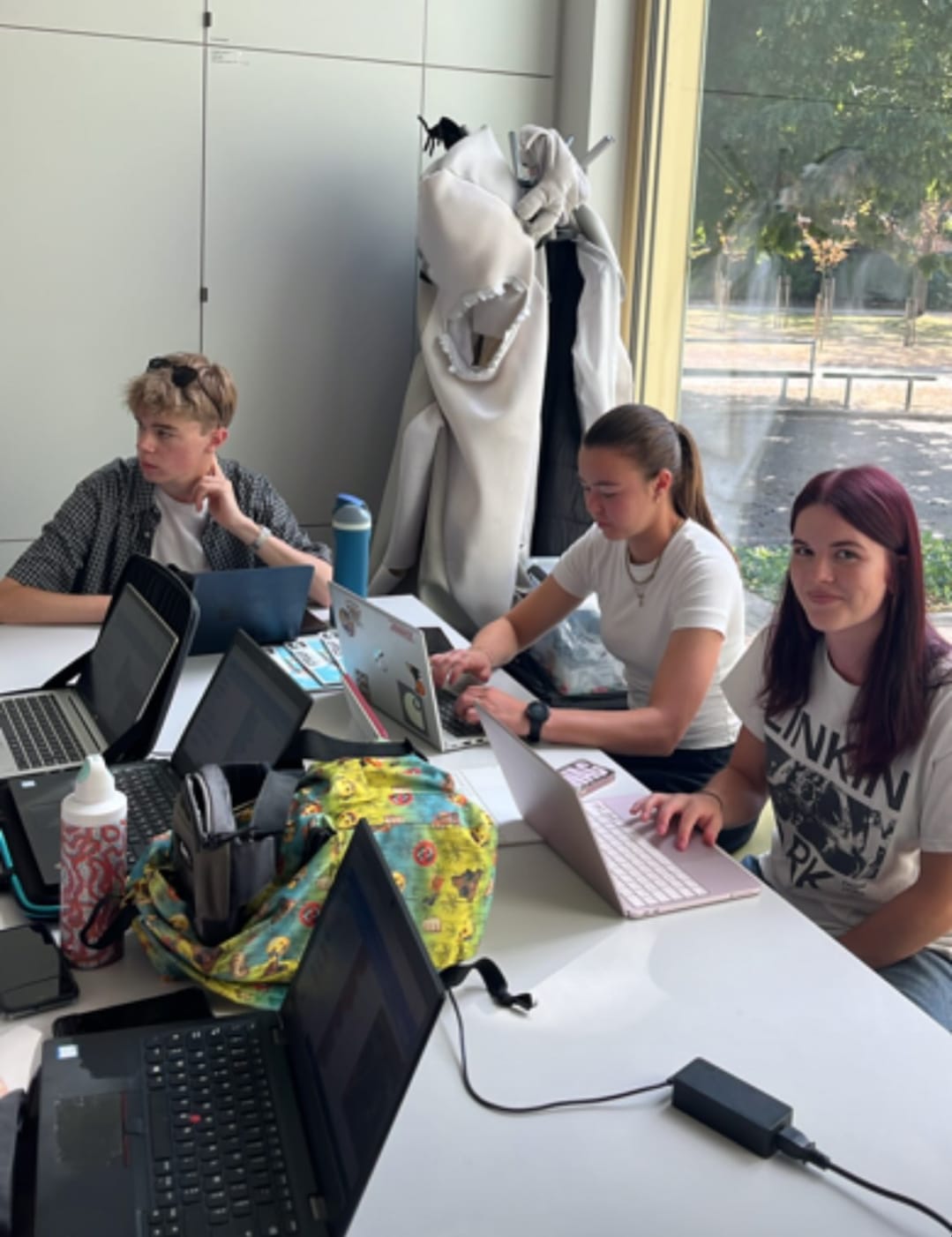 Working together at the laptops.